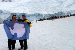 02 Charlotte Ryan, Dangles And Jerome Ryan Set Foot On The Antarctica Mainland At Neko Harbour With A Huge Glacier And Penguins Behind On Quark Expeditions Antarctica Cruise